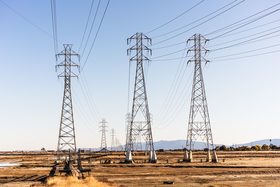 The role of electrical grids in achieving global climate goals